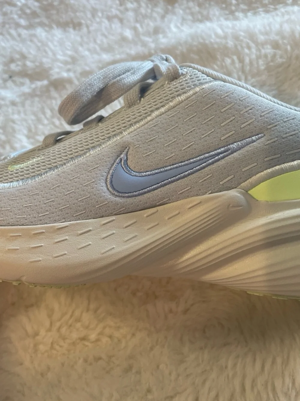 Nike White and Light Gray Sneakers with Subtle Black Swoosh